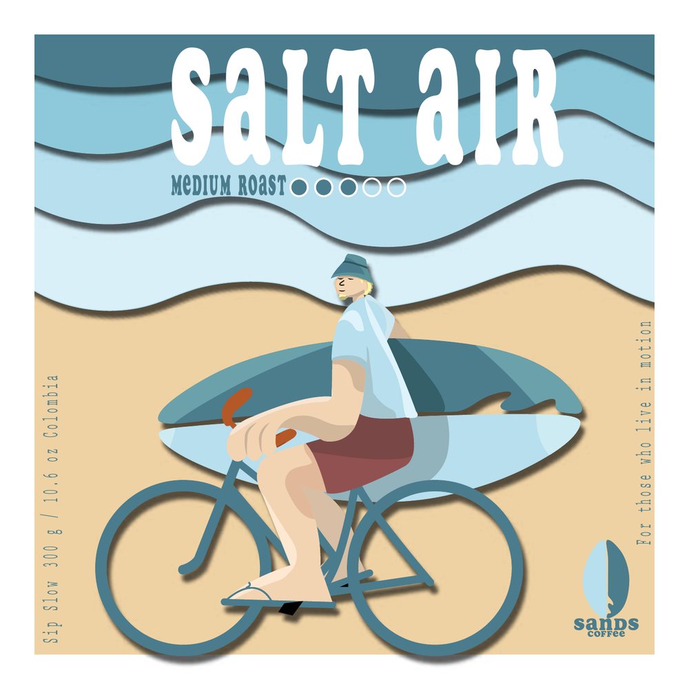 Salt Air label, a cyclist carrying a surfboard along the beach